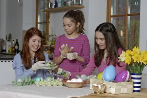 Colourful Easter Eggs Germany Prints: Girls colouring Easter eggs for Easter