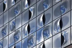 Glass Facade Architecture Prints: Glass facade with reflection of clouds