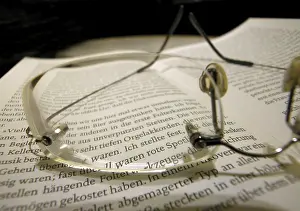 Communication Tools Prints: Glasses and book