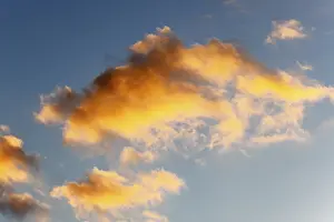 European Travel Images Prints: Glowing clouds in the evening sky at sunset