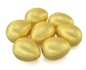 Golden Easter Egg Prints: Several golden Easter eggs isolated on white background