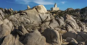 Blue Sky Coastal Scene Prints: Granite rocks with lighthouse of Capo Testa
