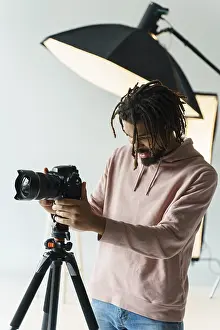 Architectural Style Photography Prints: Grapher preparing camera
