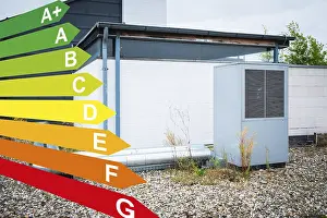 Prints of Graphic with energy efficiency classes, a heat pump on the roof of a house in Dusseldorf, Germany Graphic with energy efficiency classes, a heat pump on the roof of a house in Dsseldorf, Germany Dusseldorf Prints: Energy Efficient House Print - Dusseldorf, Germany