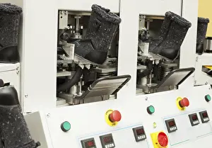 Factory Production Line Prints: Gray winterized boots in manufacturing process