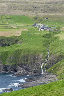 Atlantic Ocean Island Scenery Prints: Green fields with a waterfall on the coast