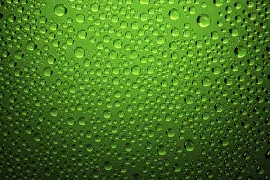 Precipitation Photography Prints: Green water drops background close up
