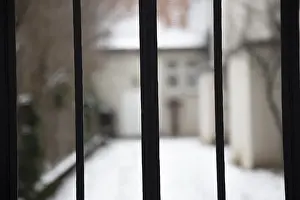 Central Europe Photography Prints: Grille with building in the background