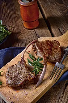 Barbecued Meat Dish Prints: Grilled lamb chops on an old board