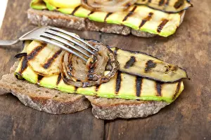 Gastronomy Photography Prints: Grilled vegetables on rustic bread over wood table