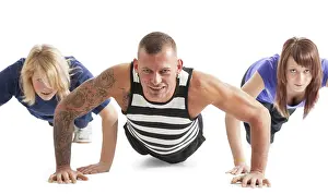 Fitness In Germany Prints: Group of three people working out
