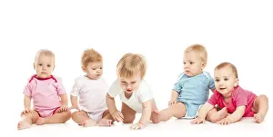 Isolated On White Background Images Prints: Group of witty babies sitting in different clothes
