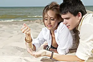 Travel Photography Prints: Guy and his girlfriend are on the beach
