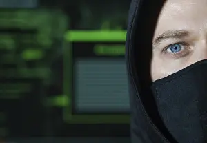Cyber Crime Protection Prints: Hacker in black mask. Hacking and internet security concept