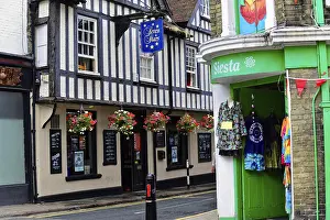 Prints of Half-timbered building with flowers and shops, typical English street scene, Canterbury, Kent, England, Great Britain Canterbury Prints: Half-timbered Building Print, Canterbury Street Scene