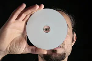 Data Storage Medium Prints: Hand holding CD