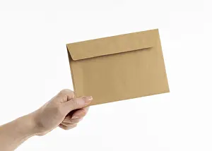 Deserted Office Supply Prints: Hand holding envelope