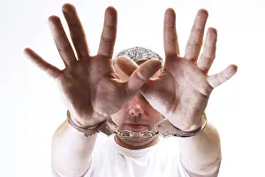 Crime Scene Photography Prints: Handcuffed man