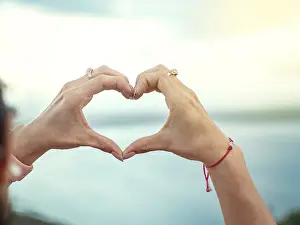 Heart Symbol Concept Prints: Hands together in a heart shape
