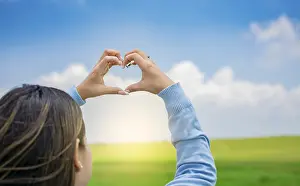 Close Up Heart Shape Prints: Hands together in a heart shape