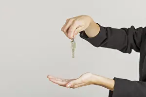 Business Attire Concept Prints: Hands holding keys