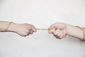 Teamwork Concept Prints: Hands pulling rope