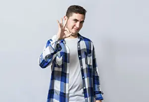 Positive Body Language Prints: Handsome guy gesturing everything is ok