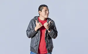 Handsome Man Pointing Prints: Handsome man pointing to the side