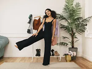Studio Photography Prints: Happy stylist posing in studio