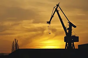 Northern Germany Evening Atmosphere Prints: Harbour crane at sunset