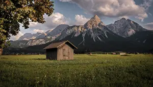 Evening Light In The Mountains Prints: Haystack, hut in a meadow, Sonnenspitze at the back