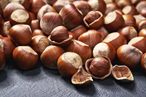 Hazelnut Background Prints: Hazelnut on black stone background