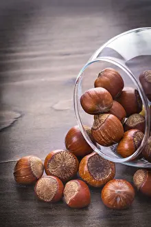Gourmet Meal Ingredients Prints: Hazelnuts in transparent jar
