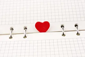 Symbolic Heart Image Prints: Heart on a checked notebook