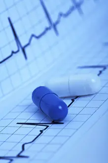 Studio Shot Medical Care Prints: Heart frequency pill