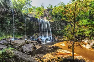 Local Man In Traditional Attire Prints: High dynamic range HDR image of tropical waterfall