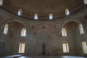 Western Asia Defence Work Prints: Historic interior with brick dome and windows that diffuse soft light into the room