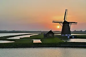 Historic Dutch Architecture Prints: Historic windmill in the light of the setting sun