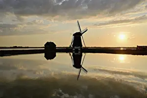 Benelux Countries Tourist Attraction Prints: Historic windmill in the light of the setting sun