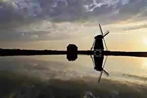 Dutch Smock Mill Prints: Historic windmill in the light of the setting sun