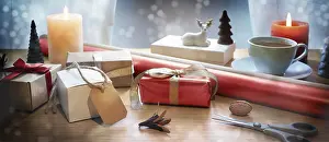 Holiday Gift Ideas Prints: Holiday gift wrapping on a table with present boxes