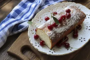 Homemade Desserts Prints: Home made cherry biscuits with vanilla and icing sugar