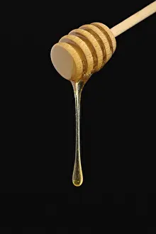 Adorable Food Still Life Prints: Honey falling from a dripper