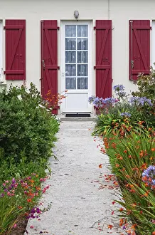 Deserted House Entrance Door Prints: House facade with mullioned windows