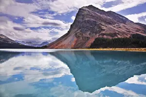 Deserted Waterfront Landscape Prints: The huge rock of the triangular form is reflected in emerald waters of cold mountain lake