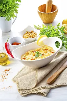 Hummus Paste Prints: Hummus paste with lemon and chilli on a white background