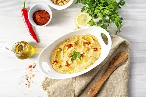 Hummus Paste Prints: Hummus paste with lemon and chilli on a white background