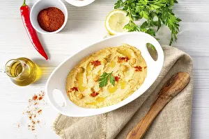 Hummus Paste Prints: Hummus paste with lemon and chilli on a white background