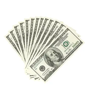 Bright White Studio Shot Prints: Hundreds of dollars spread on white background