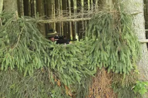 Central Europe Nature Scenery Prints: Hunter hiding at the edge of the forest